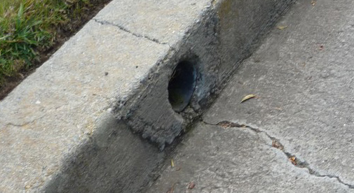 Cracked curb drain